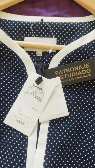 Chaqueta azul marino con topos blancos T.52