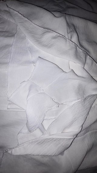 Falda blanca con volantes