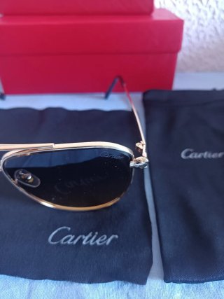 Gafas de sol Cartier doradas y negras