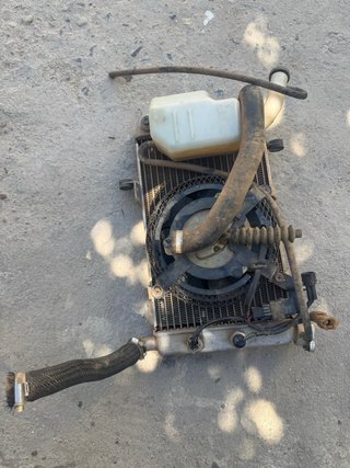 Radiador, ventilador y bote expansión suzuki ltz