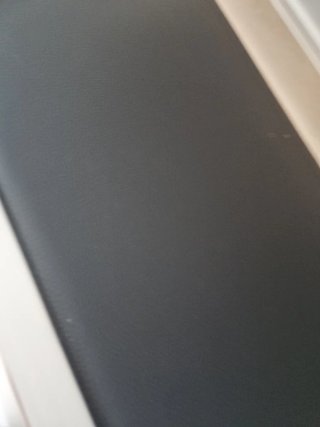 Cabecero polipiel blanco borde metalizado