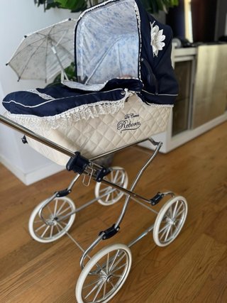 Coche de muñecas + 2 muñecas