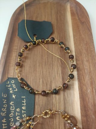 Set bracciali pietre marroni e oro