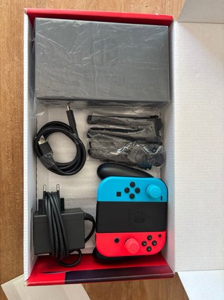 Nintendo Switch Azul/Rojo + Accesorios+ 2 Juegos