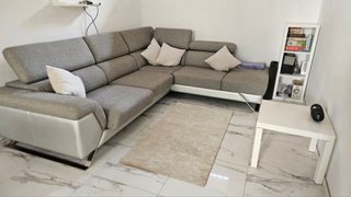 Alfombra beige de tela acrilica