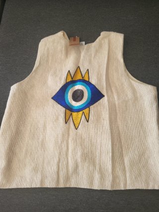 Chaleco beige estilo bohemio