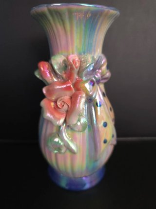 Jarrón de porcelana multicolor con flor