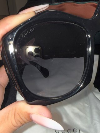 Gafas de sol Gucci negras logo dorado