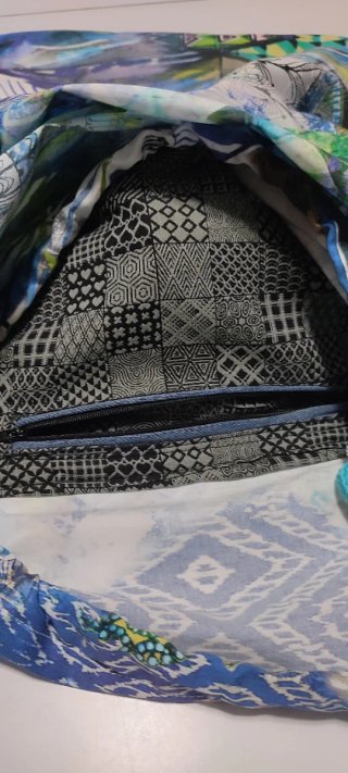Mochila Feria Albacete con bolsillo cremallera