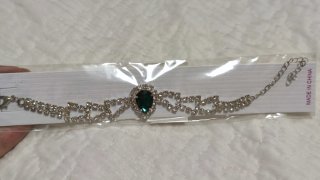 Bracciale con brillantini e pietra verde