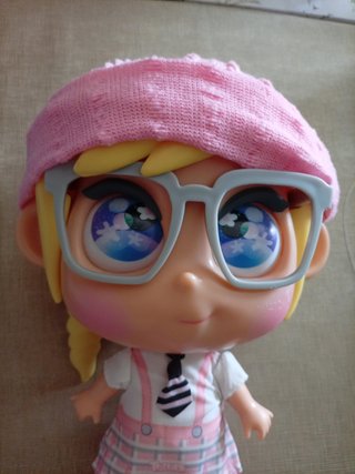 Muñeca Polly Pocket con vestido