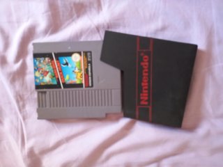 Nintendo NES con pistola y mandos