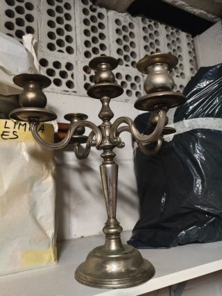 Reloj, espejo y grullas de bronce