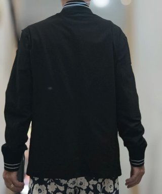 Blazer bomber Americana negra con detalles blancos
