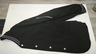 Blazer bomber Americana negra con detalles blancos