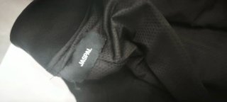Blazer bomber Americana negra con detalles blancos
