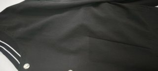 Blazer bomber Americana negra con detalles blancos