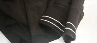 Blazer bomber Americana negra con detalles blancos