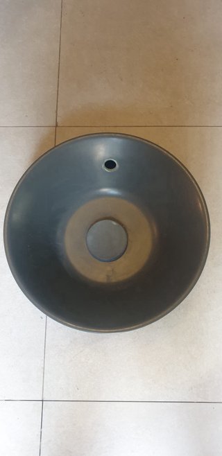 Lavabo de piedra gris