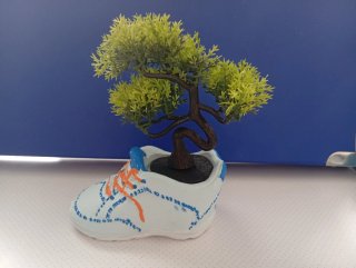 Zapatilla cerámica decorada  con planta 4€