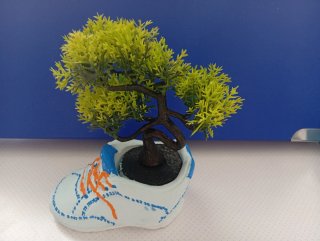 Zapatilla cerámica decorada  con planta 4€