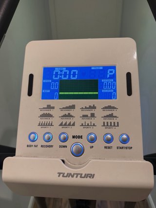 Elíptica gris y blanca profesional