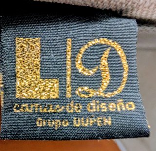 Cabezal tapizado beige Dupen.