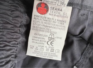 Pantaloni da lavoro blu con riflettenti
