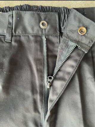 Pantaloni da lavoro blu con riflettenti