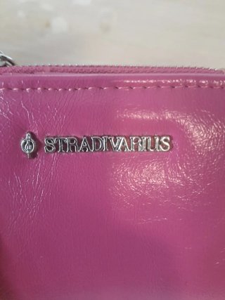 Cartera Stradivarius rosa