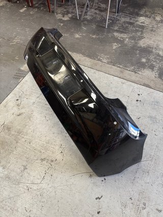 Parachoques BMW Serie 1 F20 Negro Faldones lateral