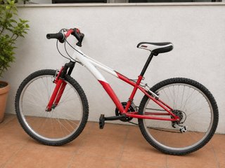 Bicicleta Orbea Roja y Blanca