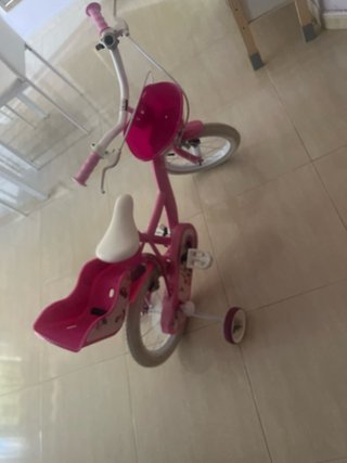 Bicicleta infantil rosa con ruedines (me custo 120