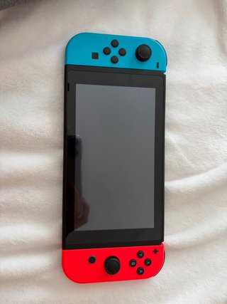 Nintendo Switch + Funda + Mando