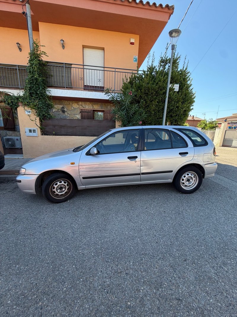 Nissan Almera 1999 - foto 1