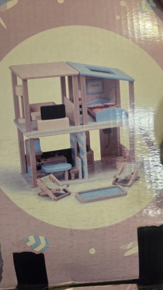 Casita de juguete de madera