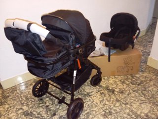 Carrito de bebé y silla coche negro