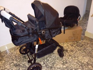 Carrito de bebé y silla coche negro