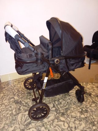 Carrito de bebé y silla coche negro