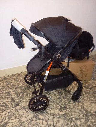 Carrito de bebé y silla coche negro