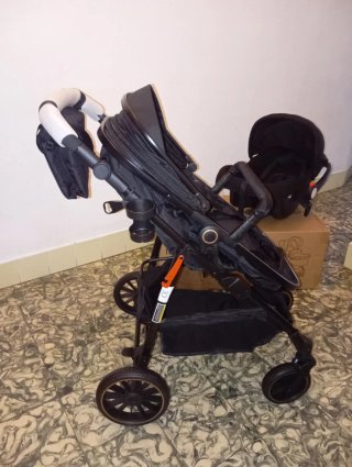 Carrito de bebé y silla coche negro