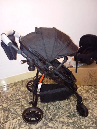 Carrito de bebé y silla coche negro