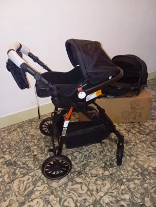 Carrito de bebé y silla coche negro
