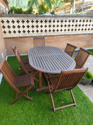 Conjunto mesa de jardín y 7 sillas