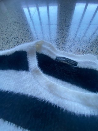 Jersey pelo rayas blanco y negro talla L