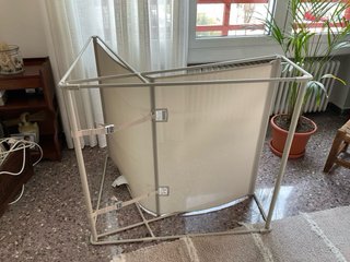 Sillón de tela y metal para interior y exterior