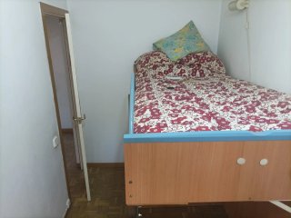 Cama alta con armario