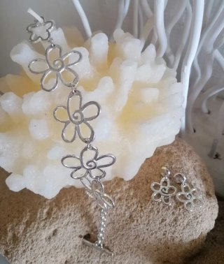 Conjunto bisutería fina  flores plata