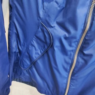 Cortavientos Quechua Azul y rojo