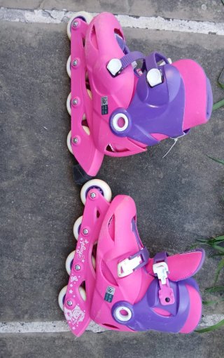 Patines infantiles Oxelo rosas y morados
